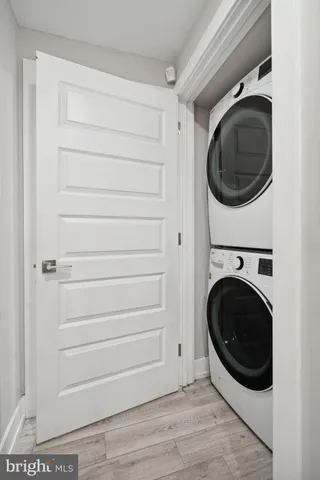 a utility room with washing machine
