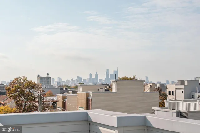 a view of a city with tall buildings