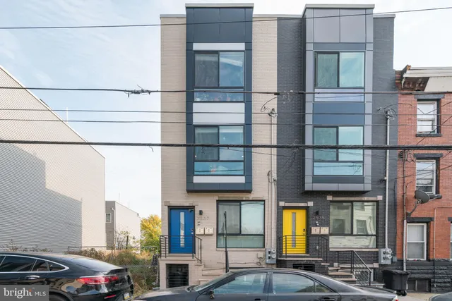 a car parked in front of a building