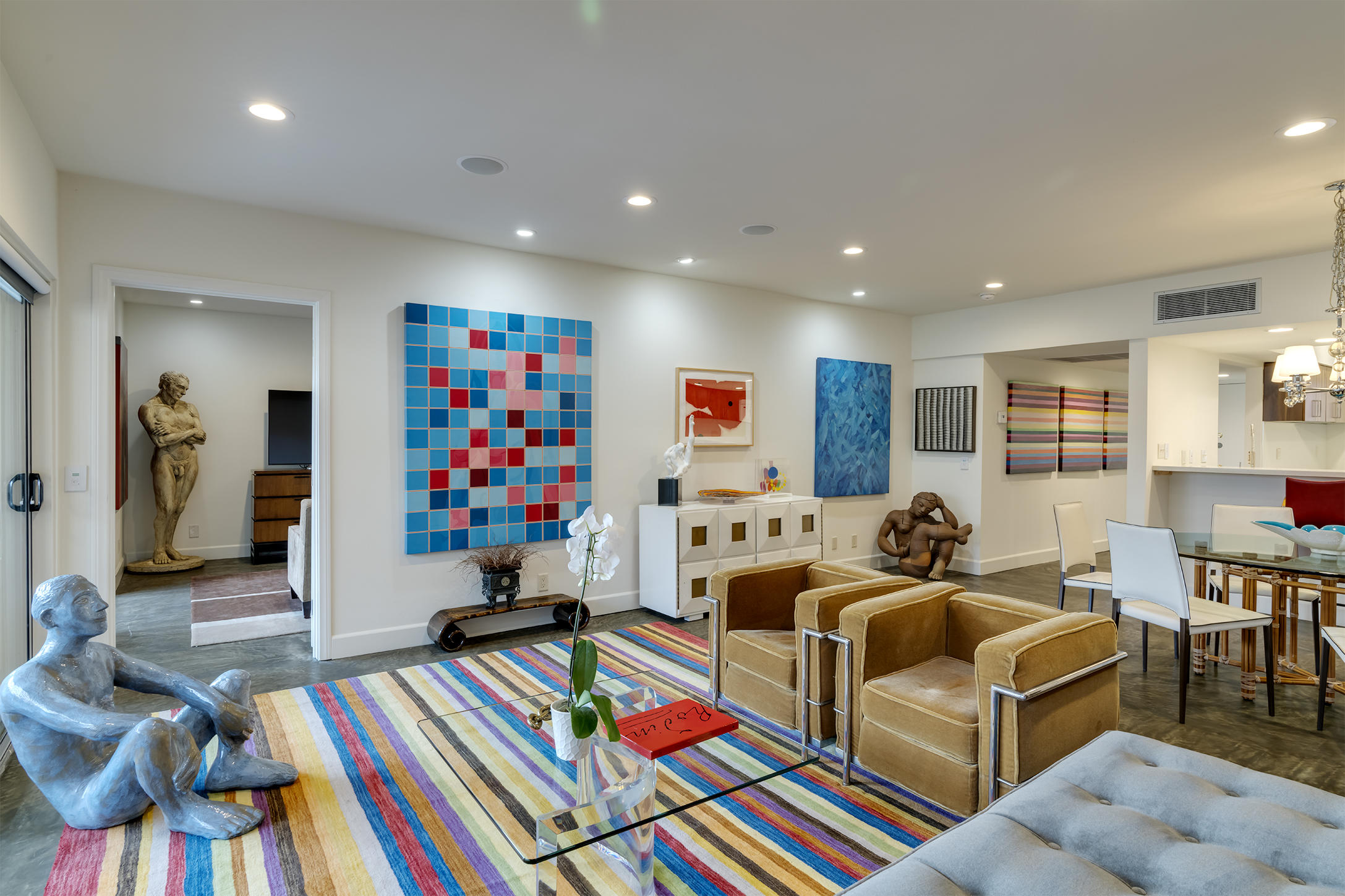 a room with furniture and a flat screen tv