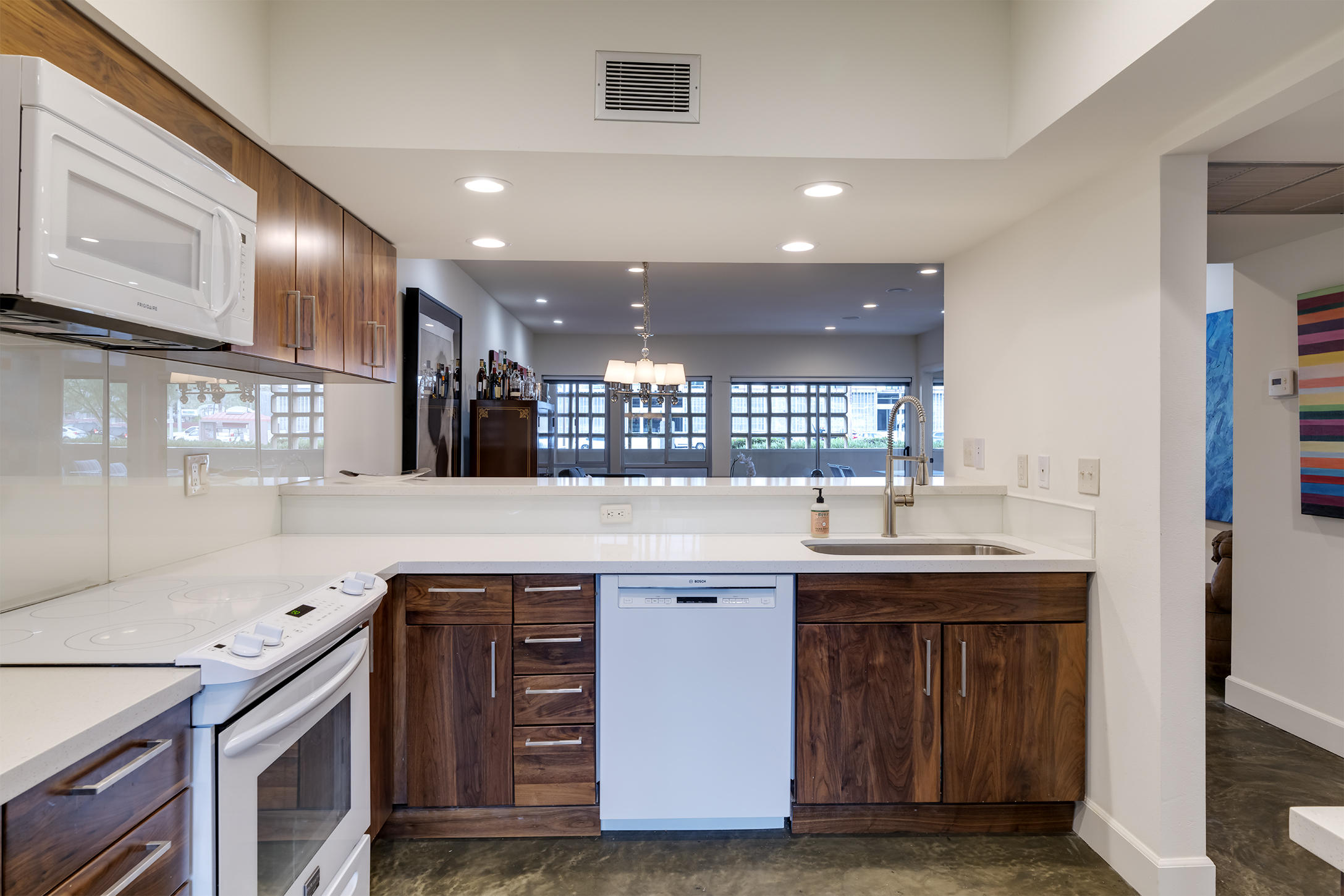 277 East Alejo Road, Unit 101 Palm Springs, CA 92262 - Photo 13 of 30 a kitchen with a sink and cabinets