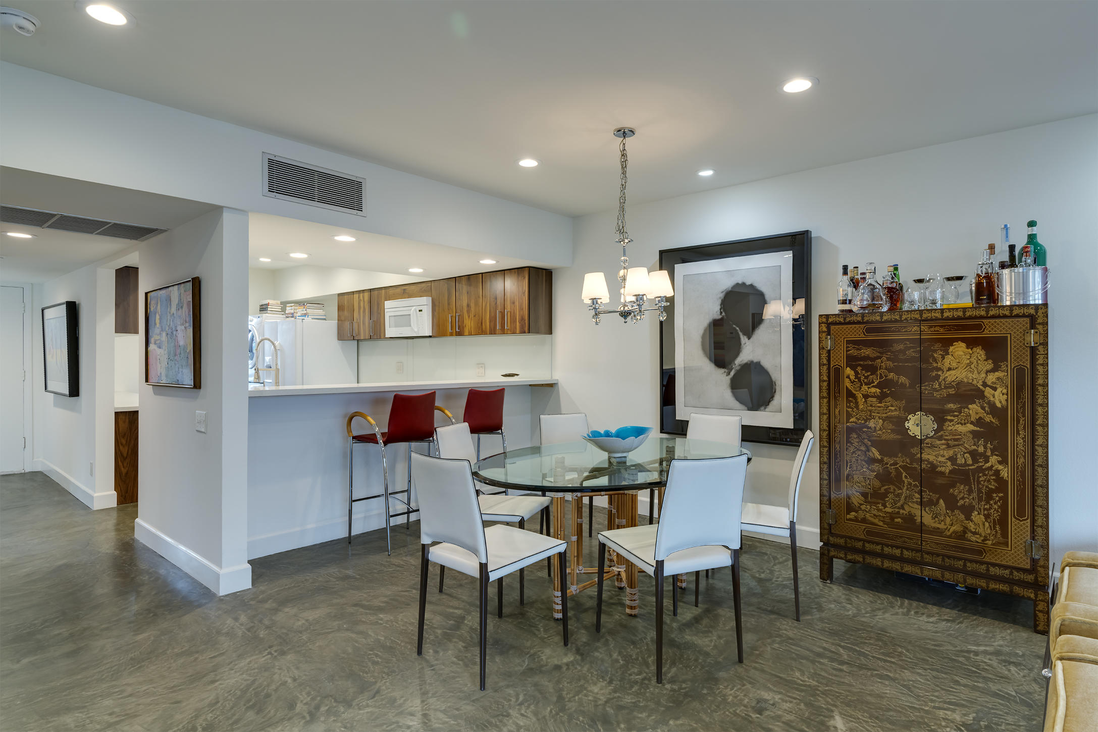 277 East Alejo Road, Unit 101 Palm Springs, CA 92262 - Photo 17 of 30 a view of a dining room with furniture