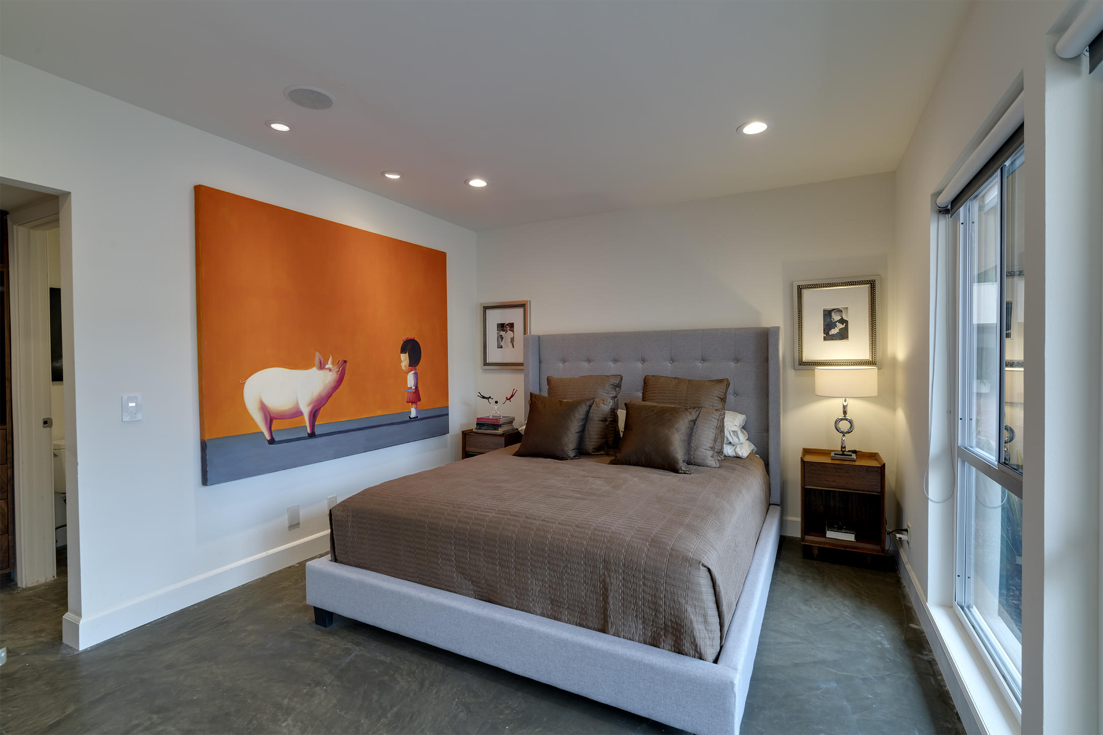 277 East Alejo Road, Unit 101 Palm Springs, CA 92262 - Photo 19 of 30 a bedroom with a bed and a painting