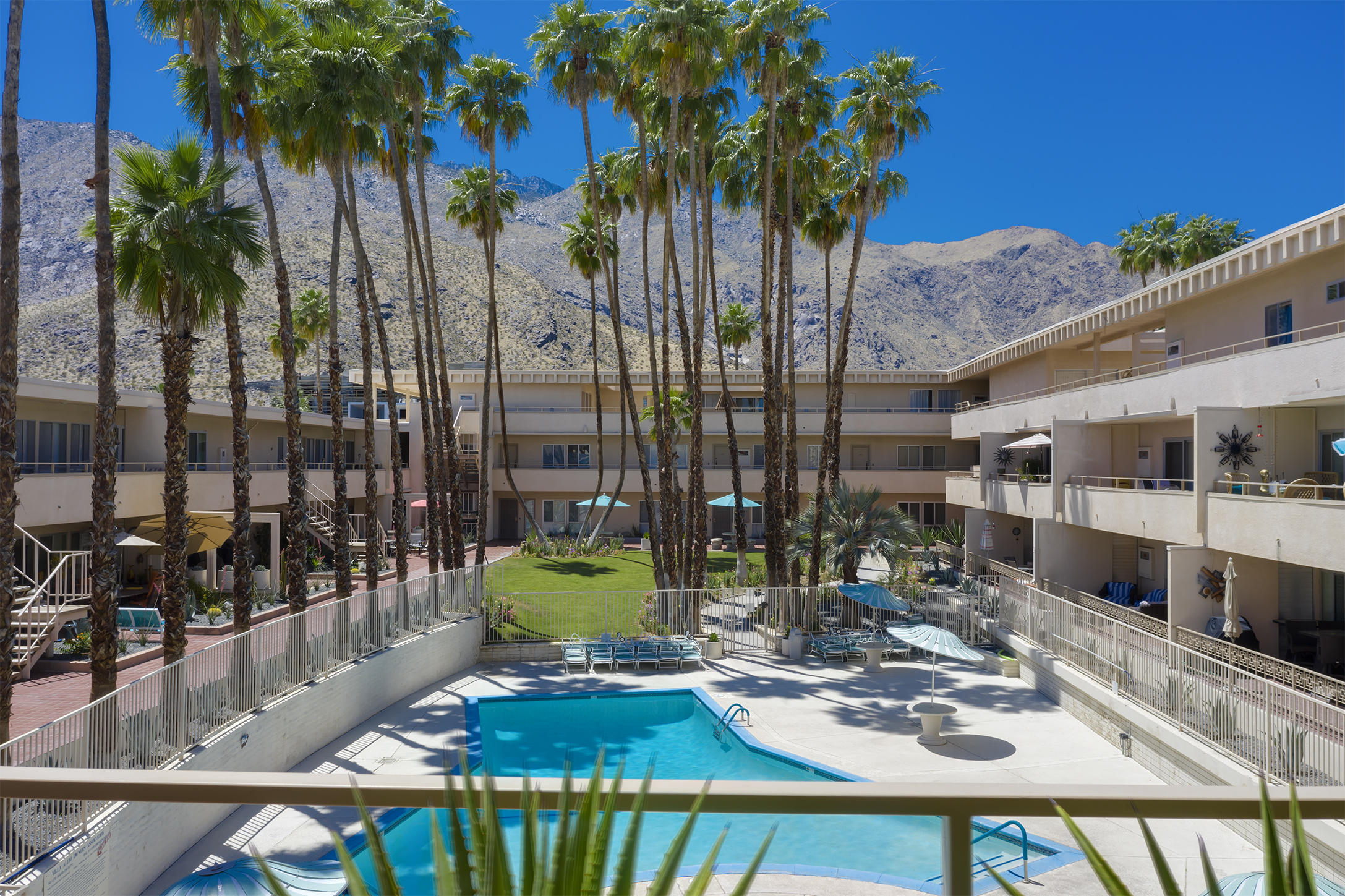 277 East Alejo Road, Unit 101 Palm Springs, CA 92262 - Photo 24 of 30 a view of swimming pool with a patio