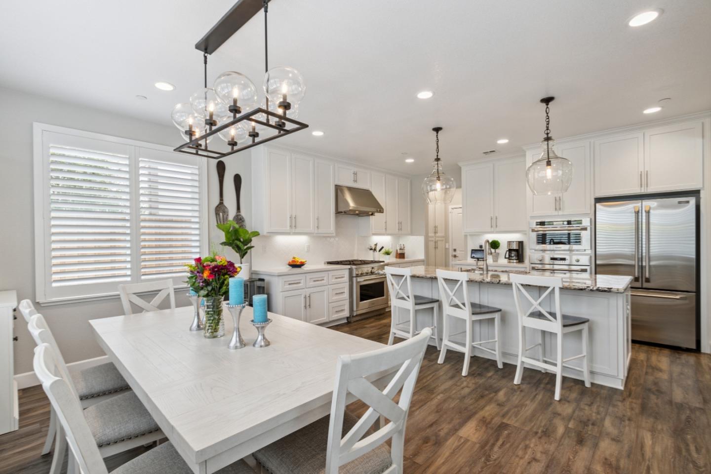 2610 Lighthouse Lane Marina, CA 93933 - Photo 14 of 43 a view of a dining room with furniture and wooden floor