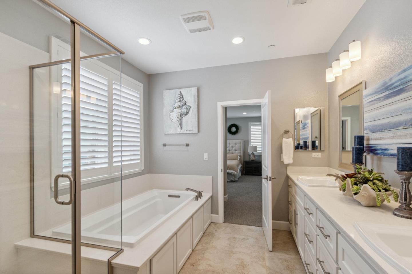 2610 Lighthouse Lane Marina, CA 93933 - Photo 31 of 43 a bathroom with a tub sink and mirror