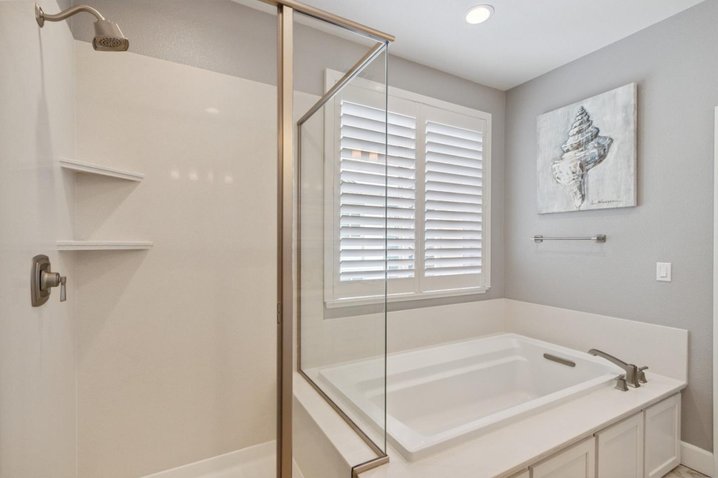 2610 Lighthouse Lane Marina, CA 93933 - Photo 32 of 43 a bathroom with a tub and a shower