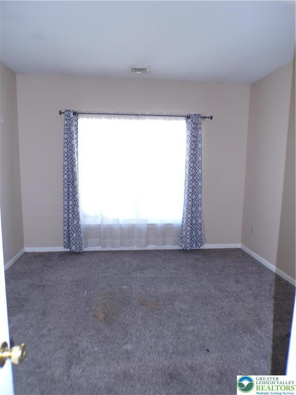 2022 Mercer Way Easton, PA 18040 - Photo 11 of 13 an empty room with windows