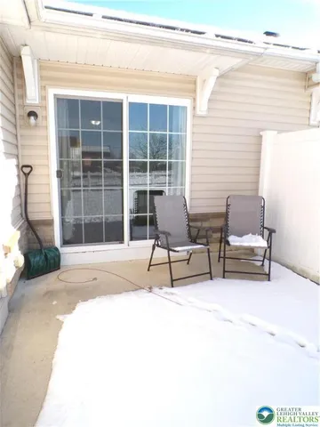 a house with a bench in front of it