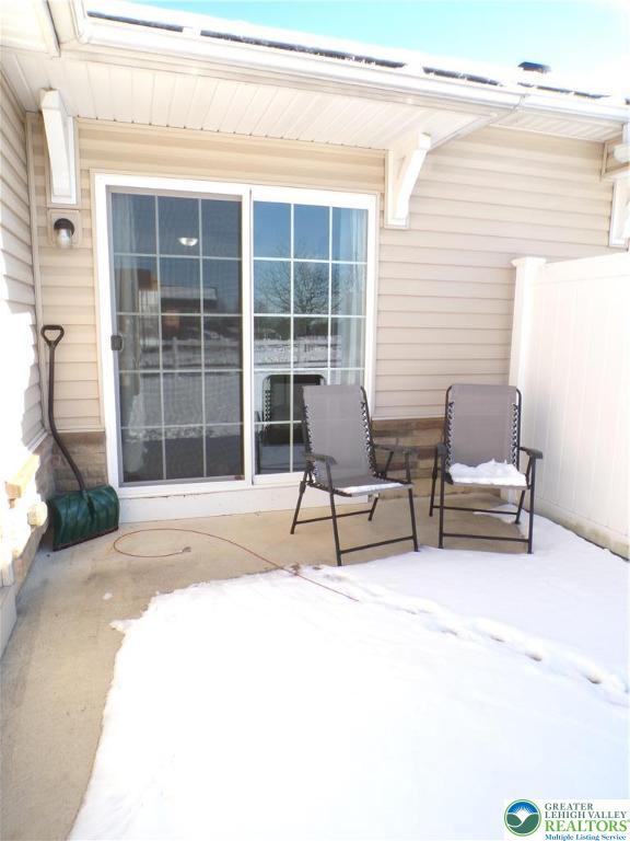 2022 Mercer Way Easton, PA 18040 - Photo 12 of 13 a house with a bench in front of it