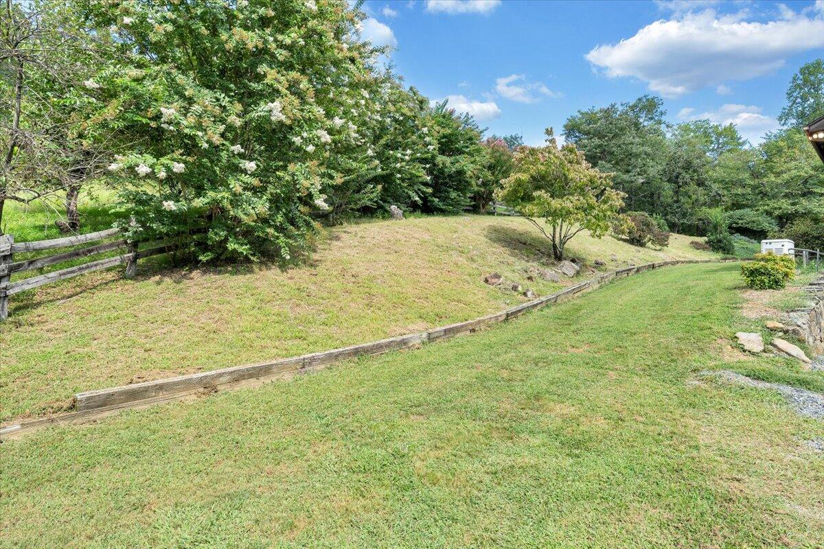 3737 Bore Auger Road Blue Ridge, VA 24064 - Photo 67 of 100 a view of a yard with an outdoor space