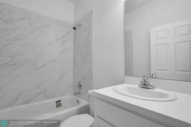 a bathroom with a sink and a bathtub