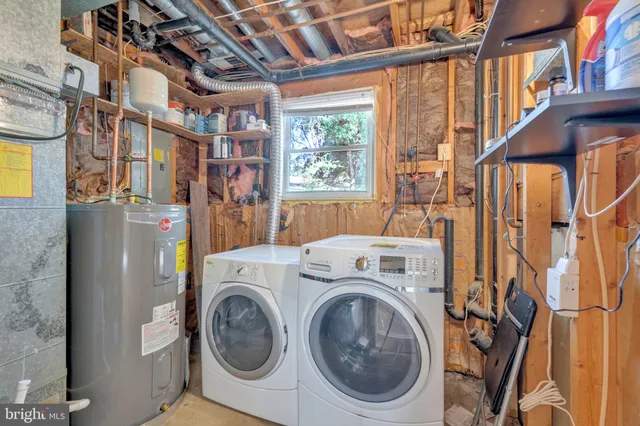 a utility room with dryer and washer