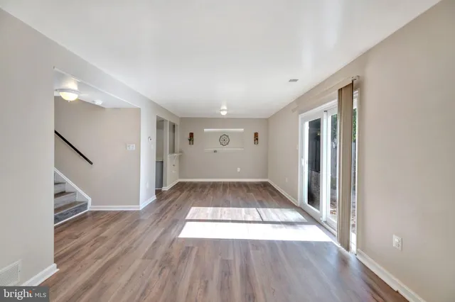 a view of entryway with wooden floor