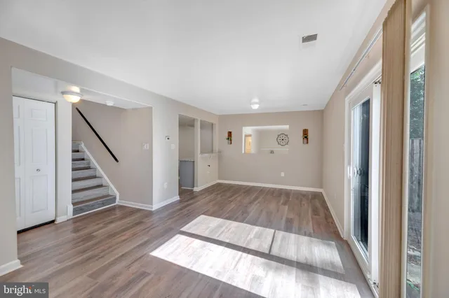 a view of entryway with wooden floor