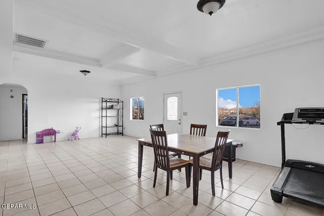 a workspace with furniture and window