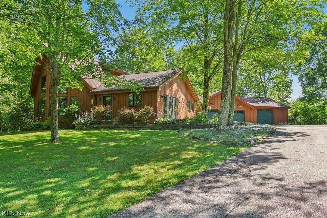 9797 Ravenna Road Chardon, OH 44024 - Photo 1 of 42 Beautiful custom-built A-frame home with attached 3 bay garage/shop