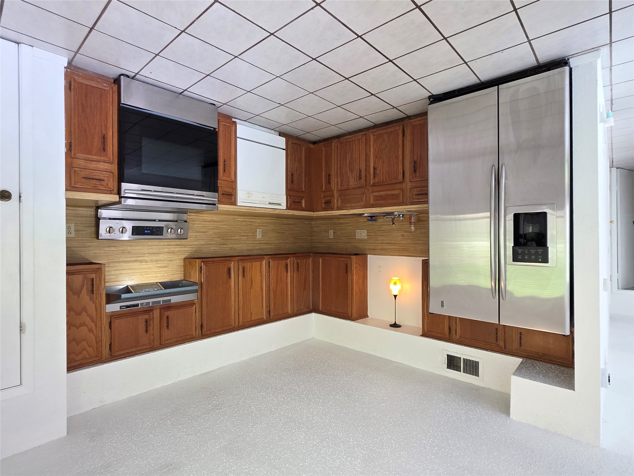 8818 Clearbrook Trail Austin, TX 78729 - Photo 7 of 22 Unit A Kitchen with Stainless Steel Appliances
