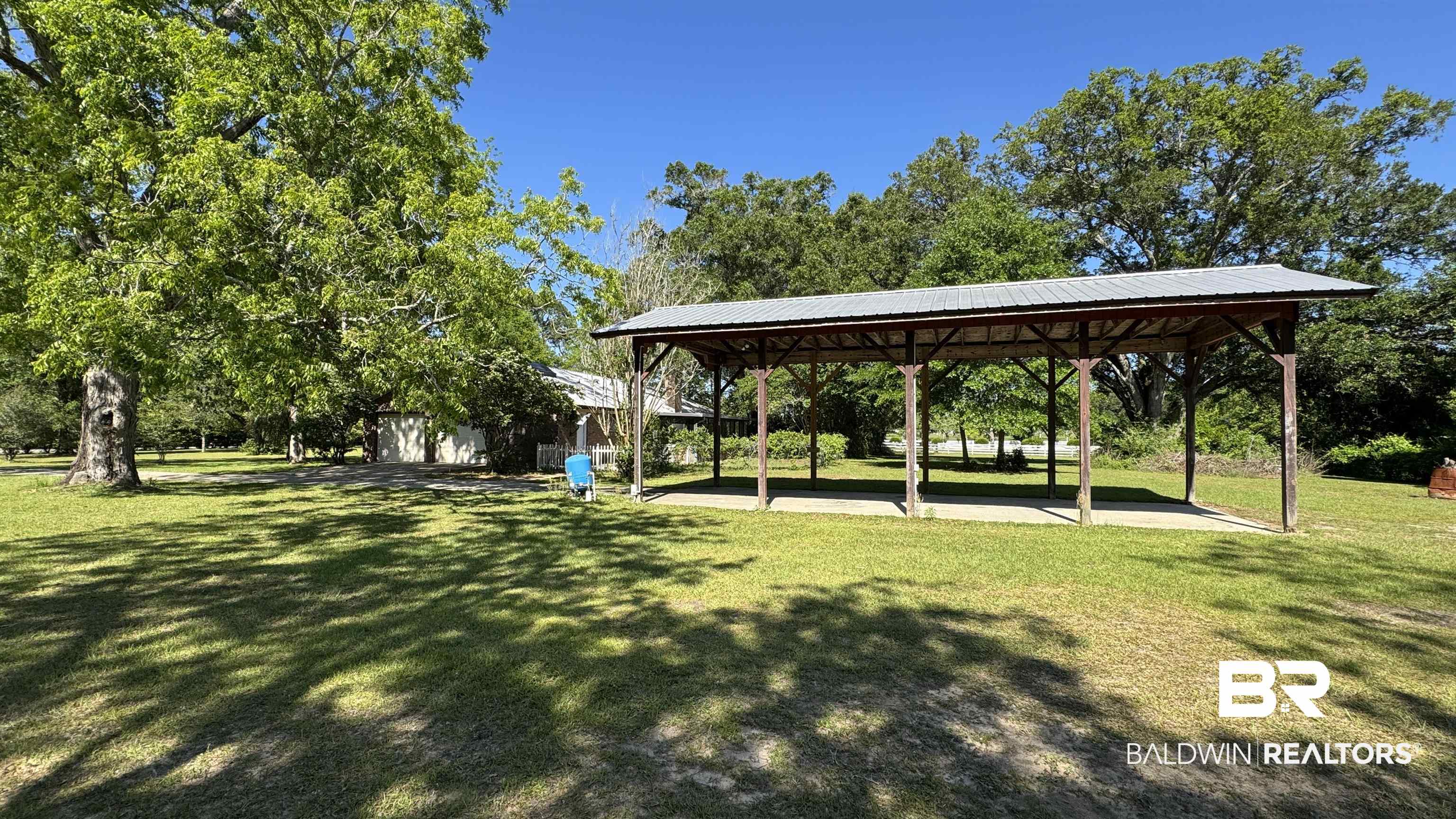33370 Highway 98 Lillian, AL 36549 - Photo 12 of 58 Expansive outdoor pavilion featuring a metal roof and open-air design