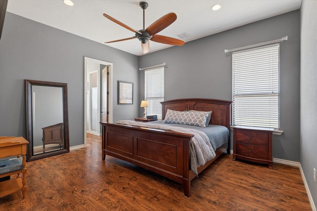 611 Mohawk Street Tioga, TX 76271 - Photo 14 of 37 Primary bathroom with extra large walk in closet and ensuite bathroom.