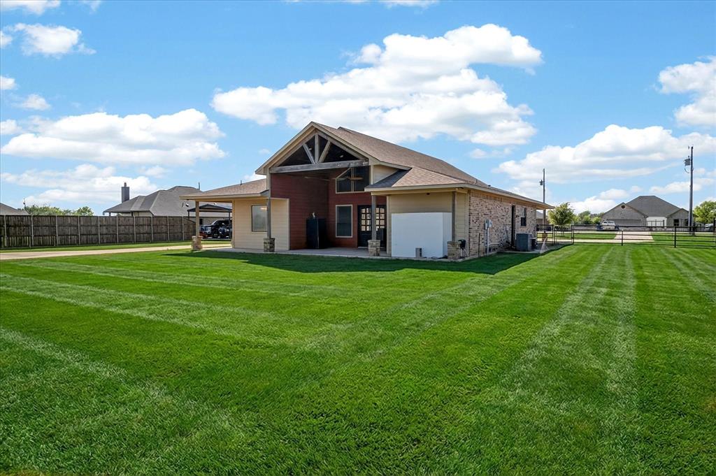 611 Mohawk Street Tioga, TX 76271 - Photo 30 of 37 Beautiful back yard! Storm shelter is included in the sale.