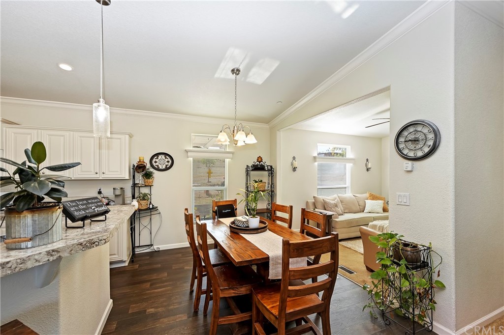 23161 Forrest Road Perris, CA 92570 - Photo 11 of 43 a view of a dining room and livingroom view