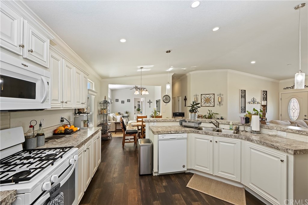 23161 Forrest Road Perris, CA 92570 - Photo 13 of 43 a kitchen with lots of counter top space and appliances