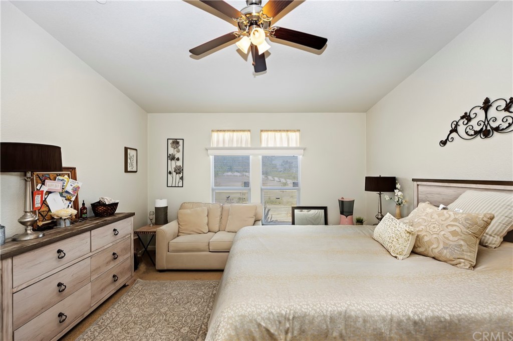 23161 Forrest Road Perris, CA 92570 - Photo 21 of 43 a bedroom with a large bed and a window