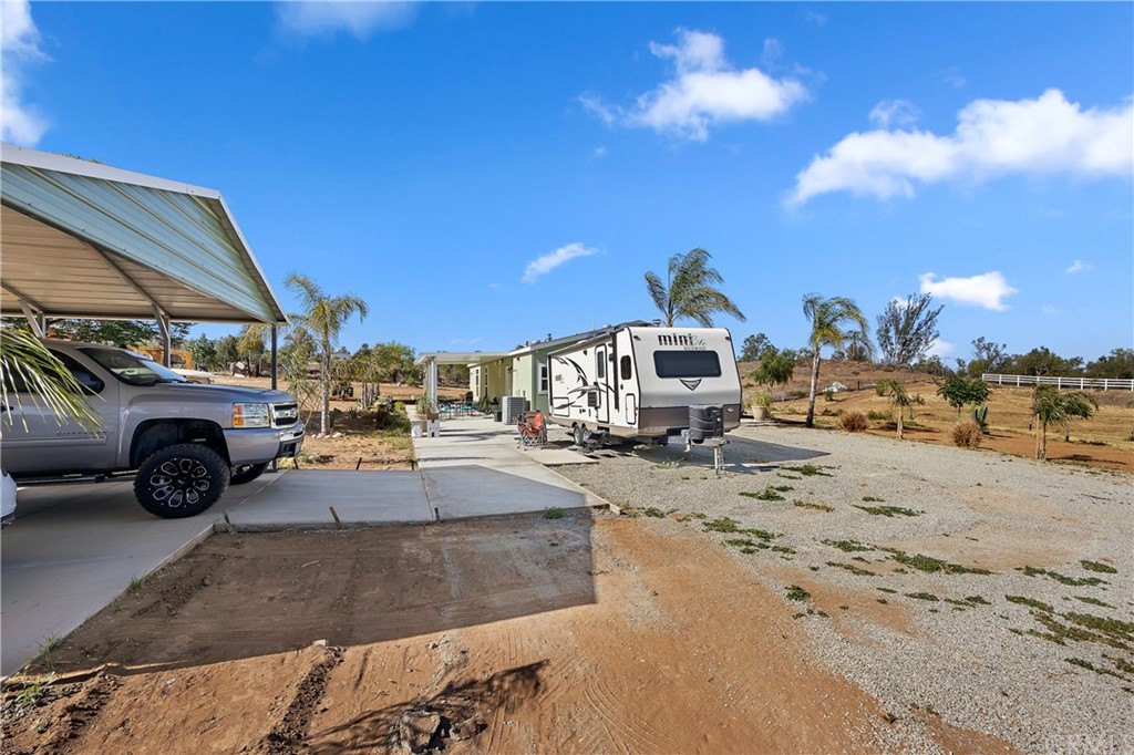 23161 Forrest Road Perris, CA 92570 - Photo 28 of 43 a view of a street with cars