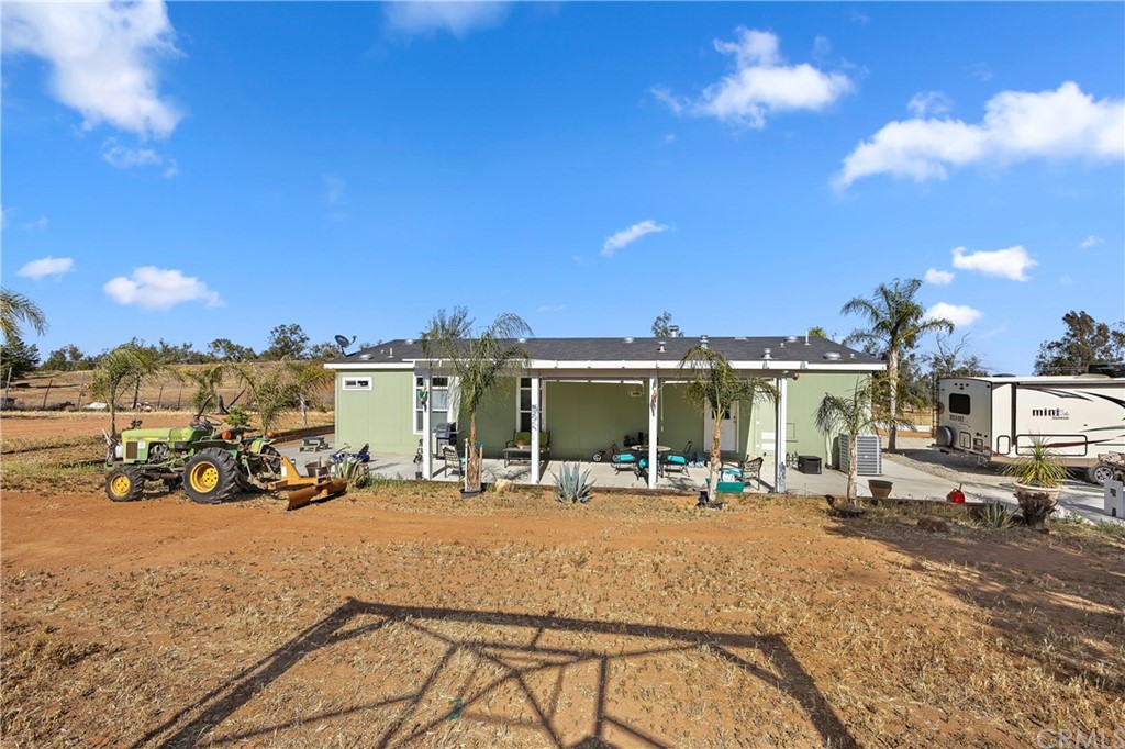 23161 Forrest Road Perris, CA 92570 - Photo 32 of 43 a view of a building with outdoor space and having patio