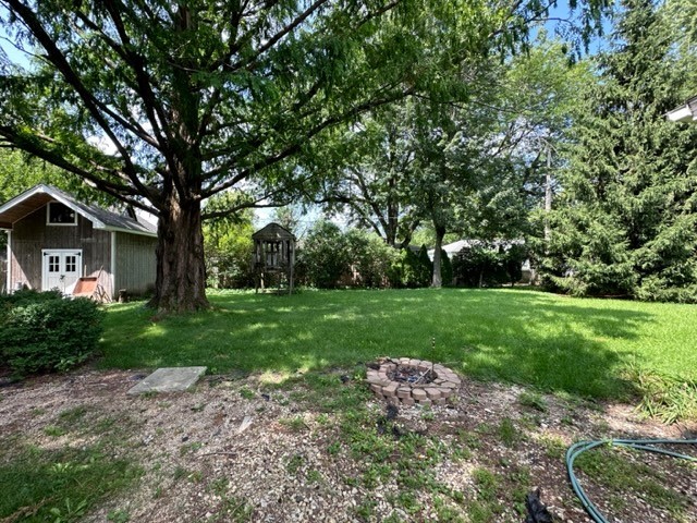 224 Maple Lane Geneva, IL 60134 - Photo 11 of 12 a front view of a house with garden