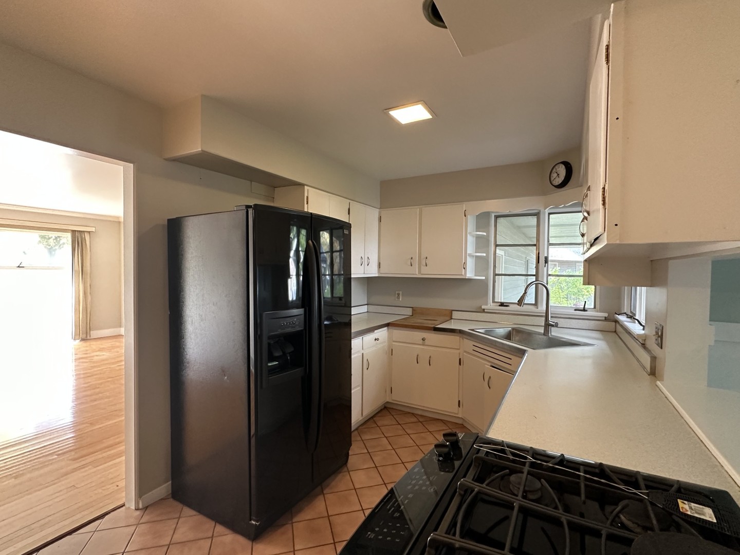 224 Maple Lane Geneva, IL 60134 - Photo 4 of 12 a kitchen with stainless steel appliances a refrigerator a sink a stove and cabinets