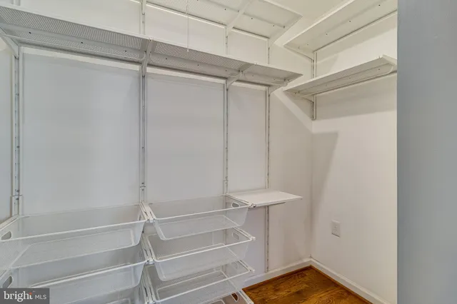 a view of a room with racks on the wall