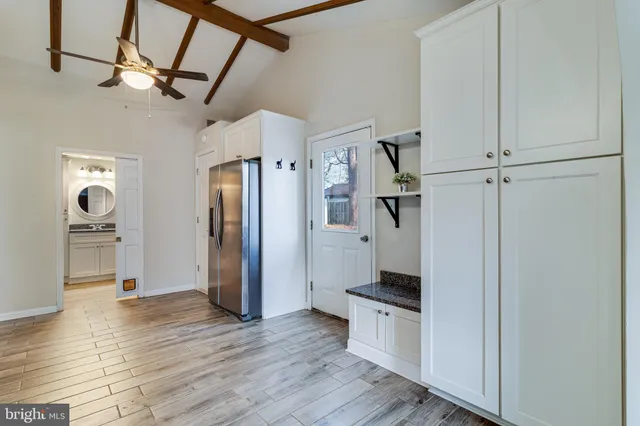 a view of a kitchen & a sink