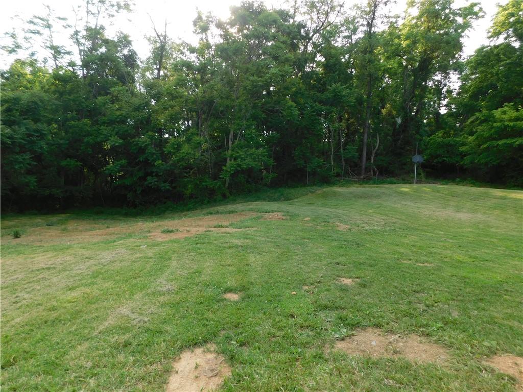 110 Auto Auction Road Uniontown, PA 15401 - Photo 4 of 7 a view of outdoor space with deck and yard
