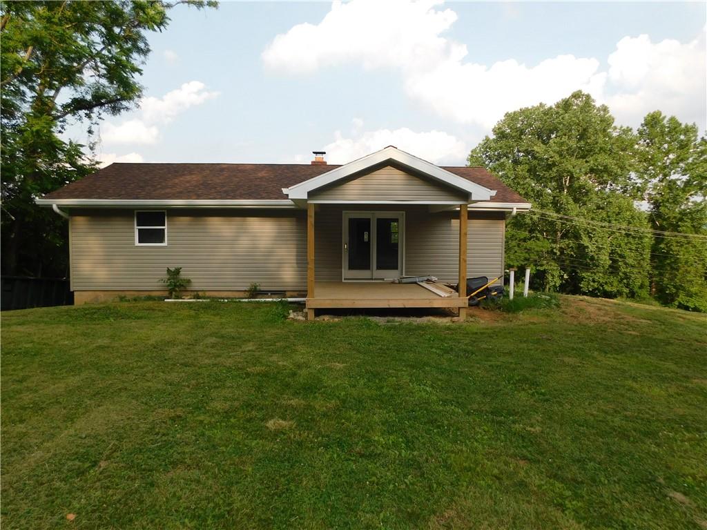 110 Auto Auction Road Uniontown, PA 15401 - Photo 5 of 7 a front view of house with yard and green space