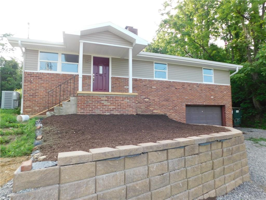 110 Auto Auction Road Uniontown, PA 15401 - Photo 6 of 7 a front view of a house with yard