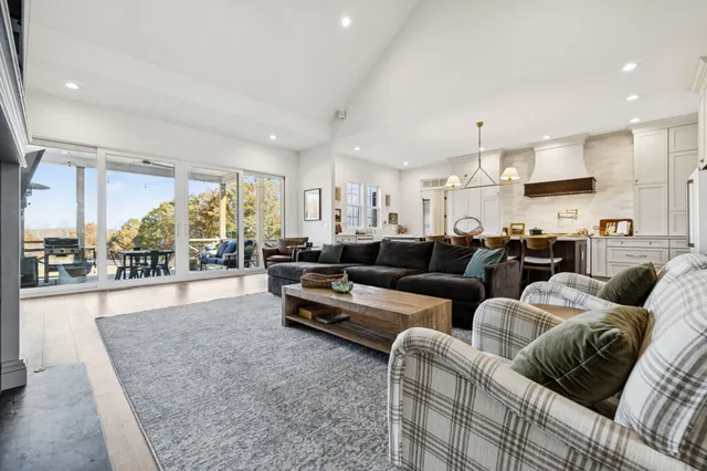 a view of a swimming pool with a lake view and mountain view