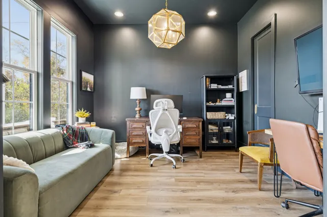 a view of a dining room with furniture window and outside view