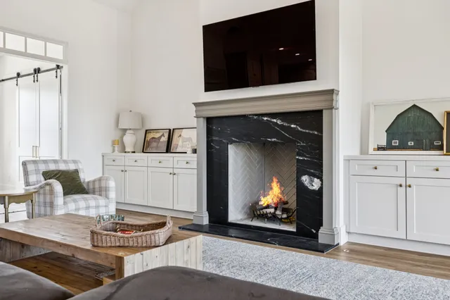a large kitchen with kitchen island a large island in the center