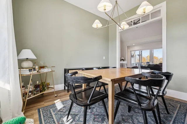 a kitchen with stainless steel appliances a sink and a refrigerator