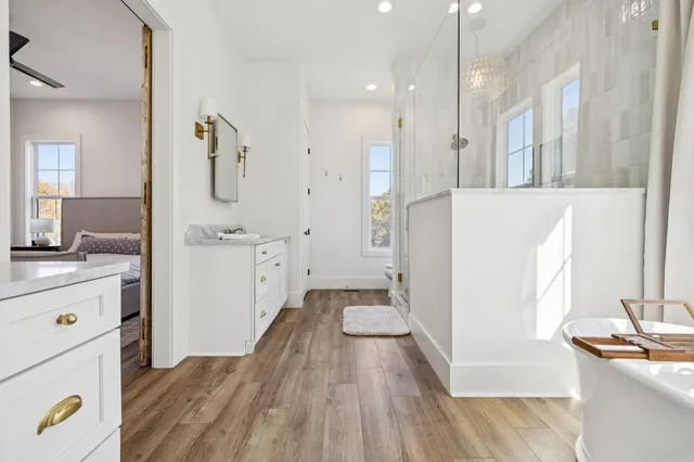 a front view of a house with a big yard