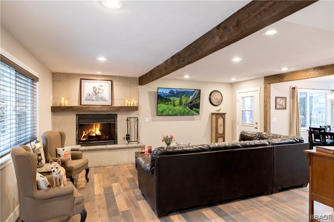 270 Spruce Lane Sugarloaf, CA 92386 - Photo 12 of 39 a living room with furniture and a fireplace
