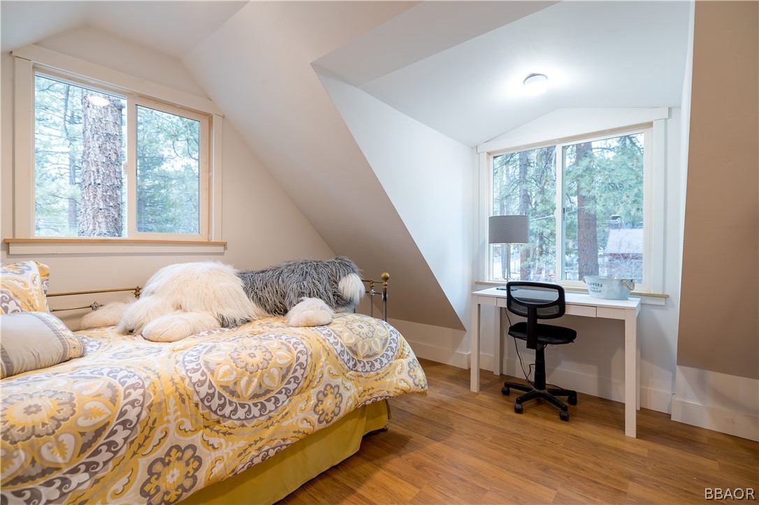 270 Spruce Lane Sugarloaf, CA 92386 - Photo 27 of 39 a bedroom with a bed and a desk