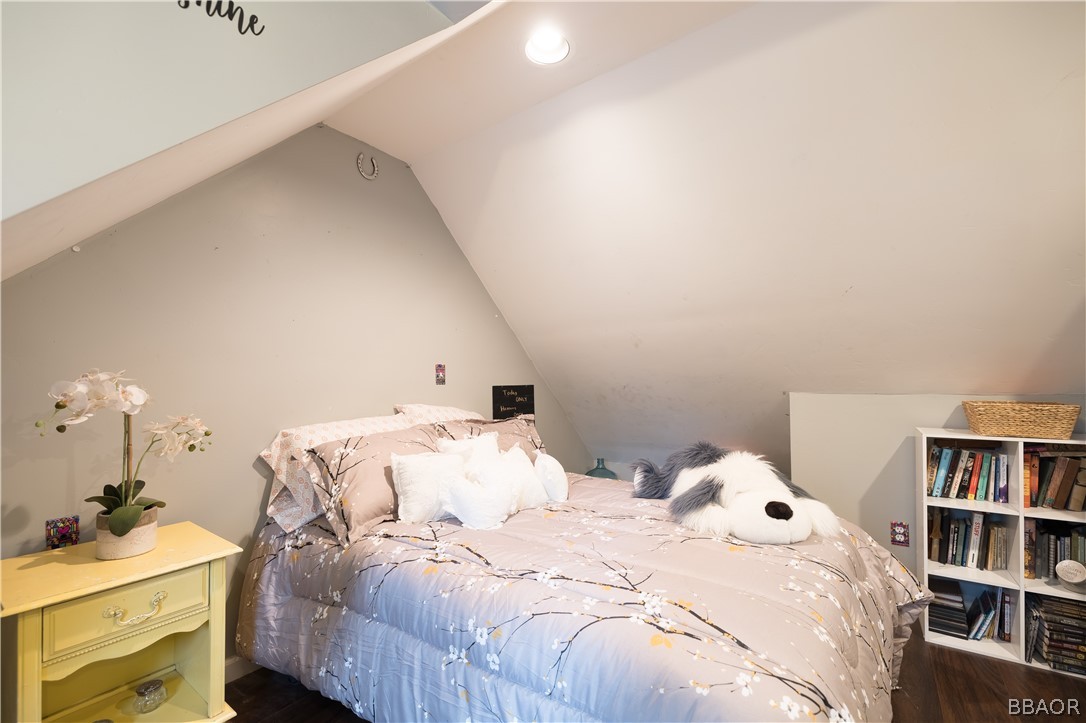 270 Spruce Lane Sugarloaf, CA 92386 - Photo 28 of 39 a bedroom with a bed and a cabinets