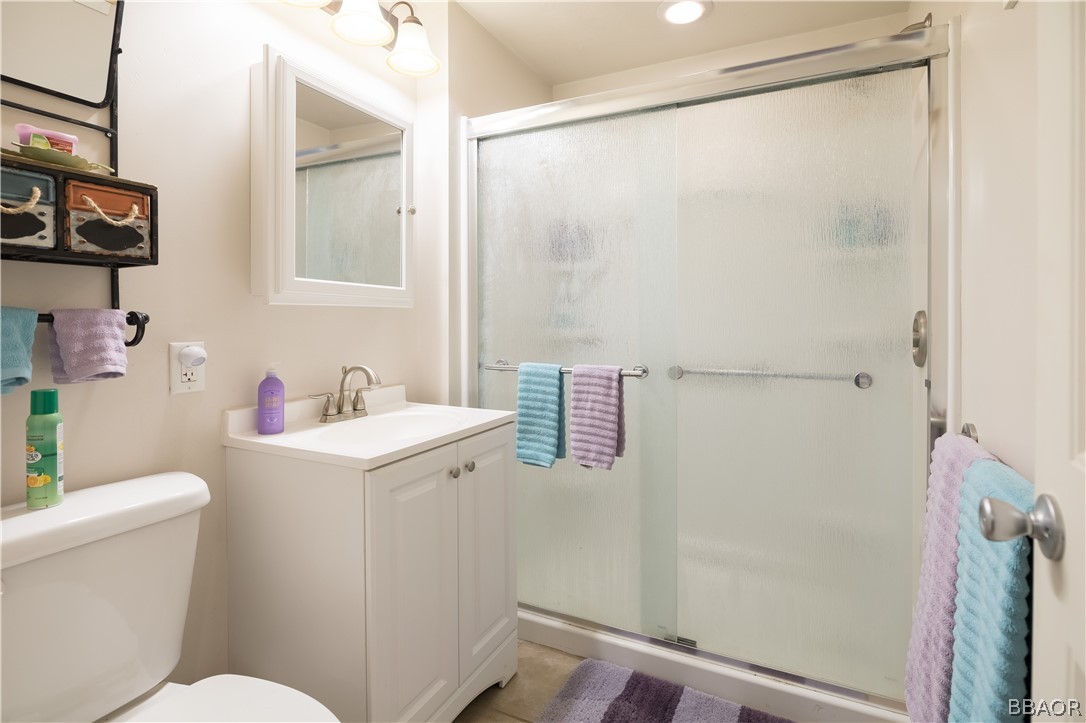 270 Spruce Lane Sugarloaf, CA 92386 - Photo 30 of 39 a bathroom with a sink a toilet and shower