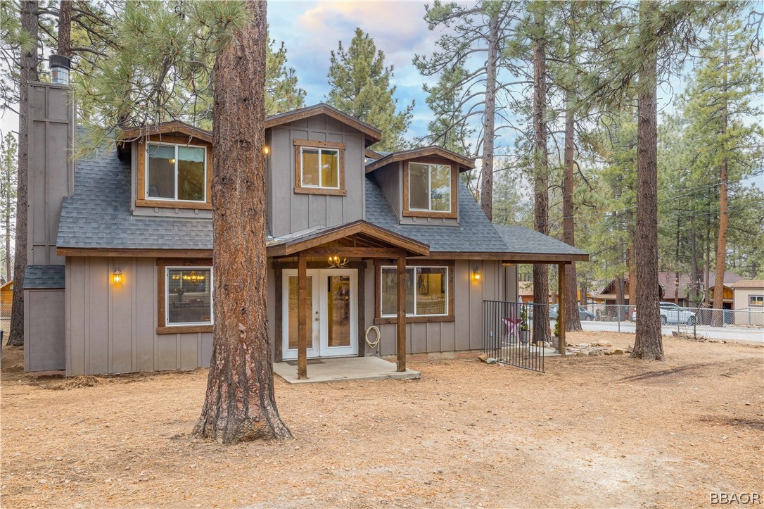 270 Spruce Lane Sugarloaf, CA 92386 - Photo 3 of 39 a front view of a house with a yard