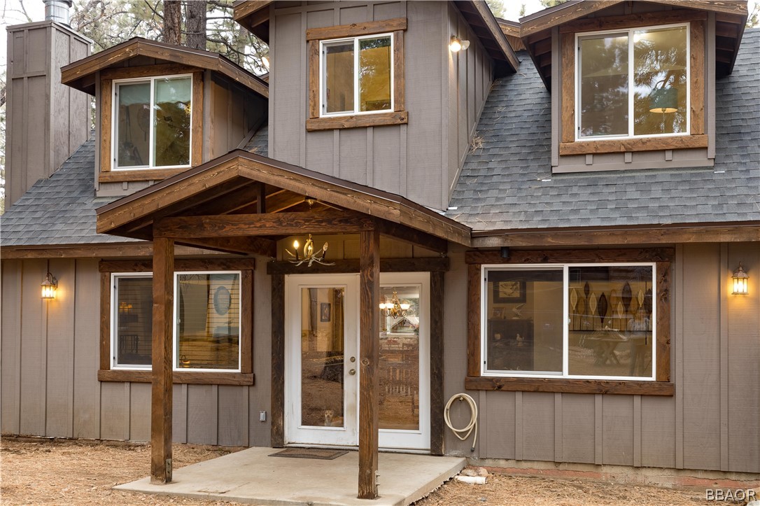 270 Spruce Lane Sugarloaf, CA 92386 - Photo 37 of 39 a front view of a house with a yard