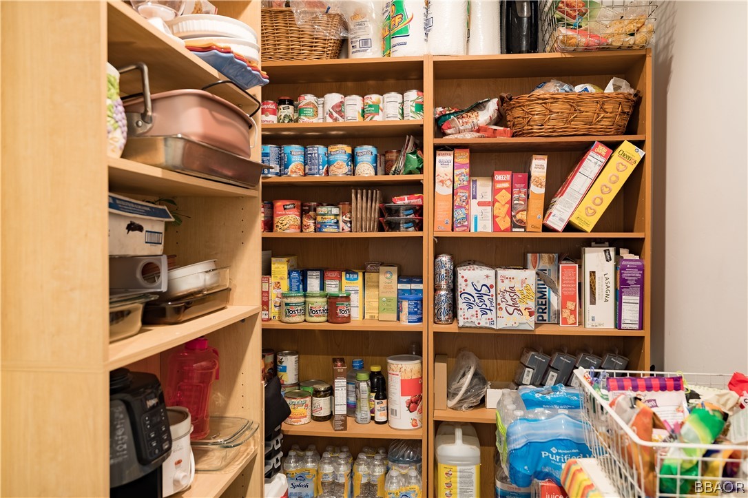 270 Spruce Lane Sugarloaf, CA 92386 - Photo 39 of 39 a room with shelf and a painting on the wall