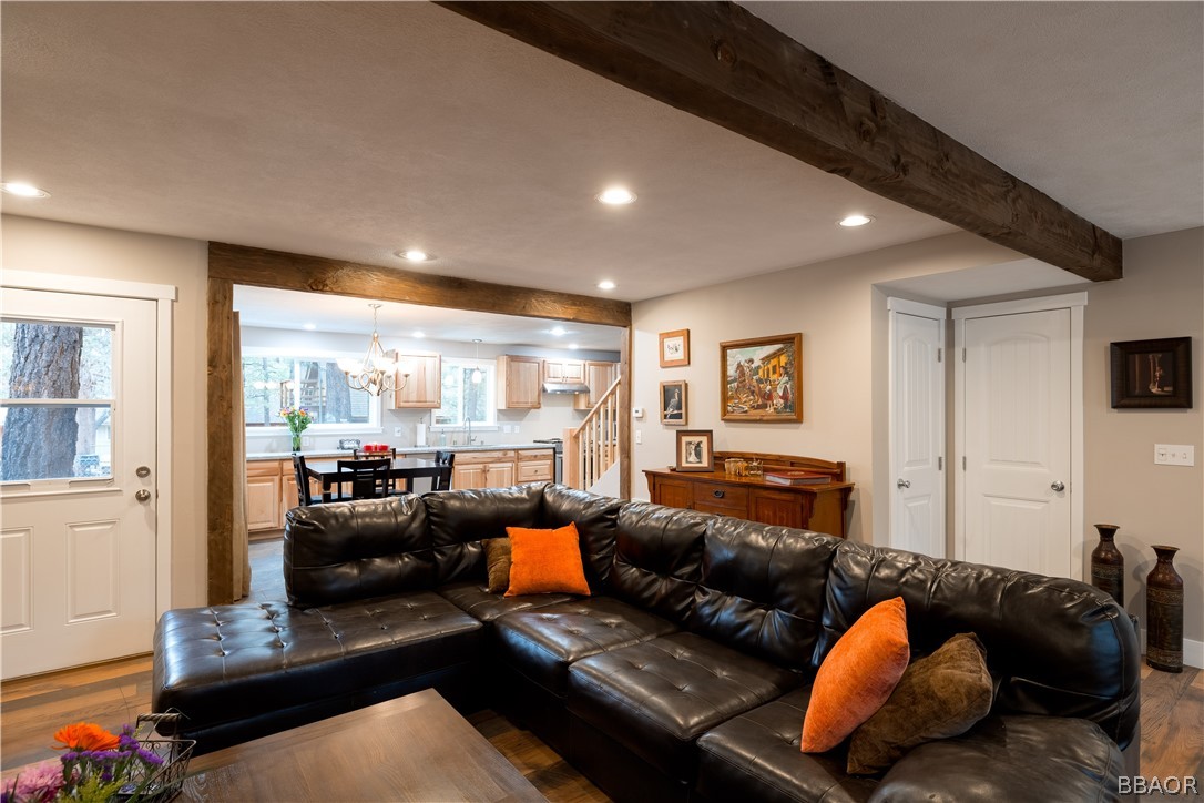 270 Spruce Lane Sugarloaf, CA 92386 - Photo 8 of 39 a living room with furniture and a large window
